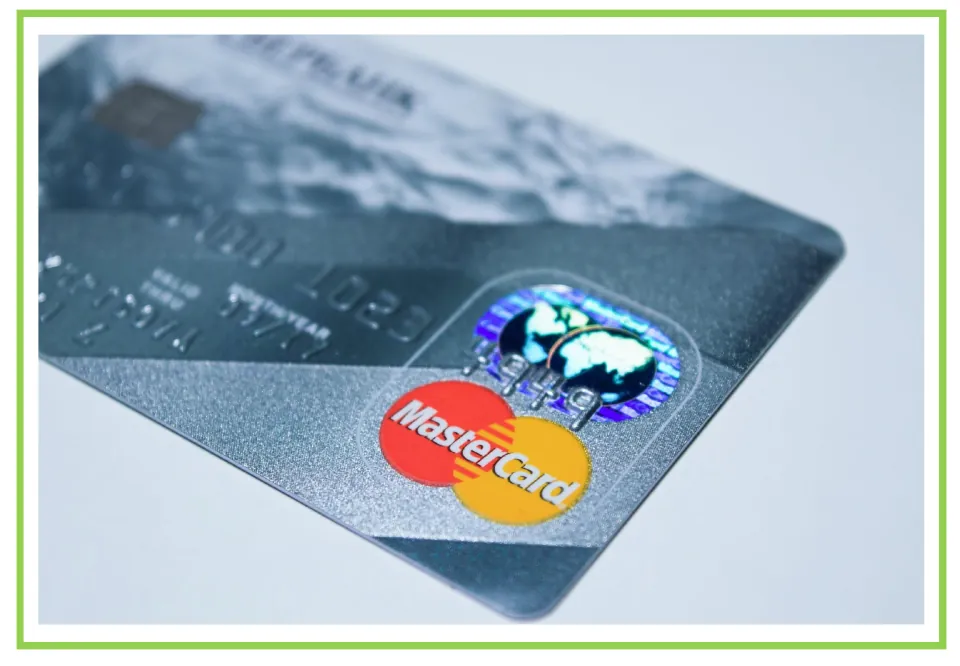 Shopping discussion and writing prompt card 7: a close-up of a payment card showing the MasterCard logo