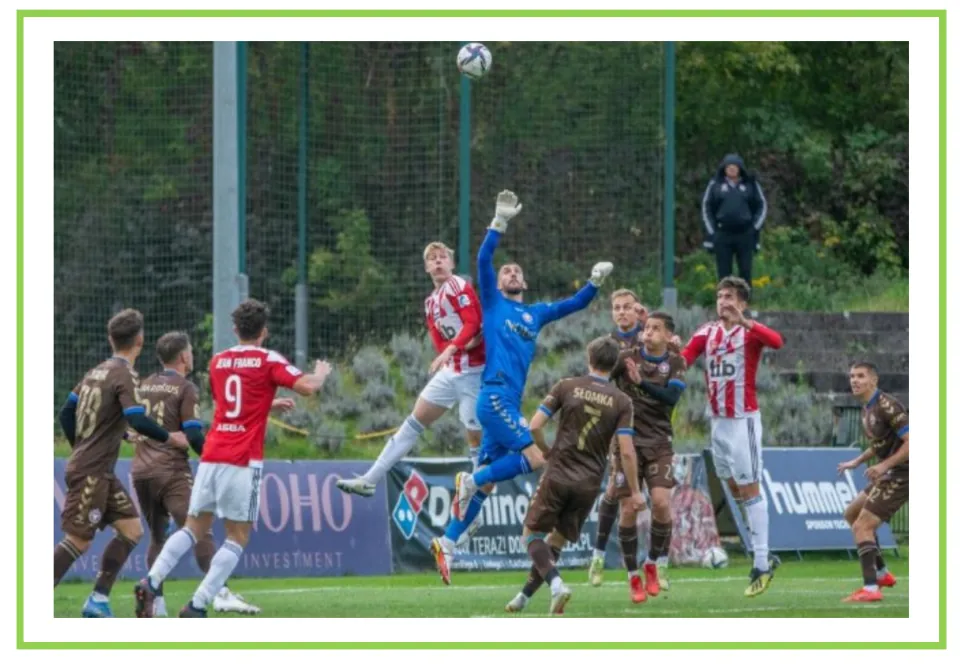 Soccer writing and discussion flashcard showing a goalkeeper reaching for a high ball among other players