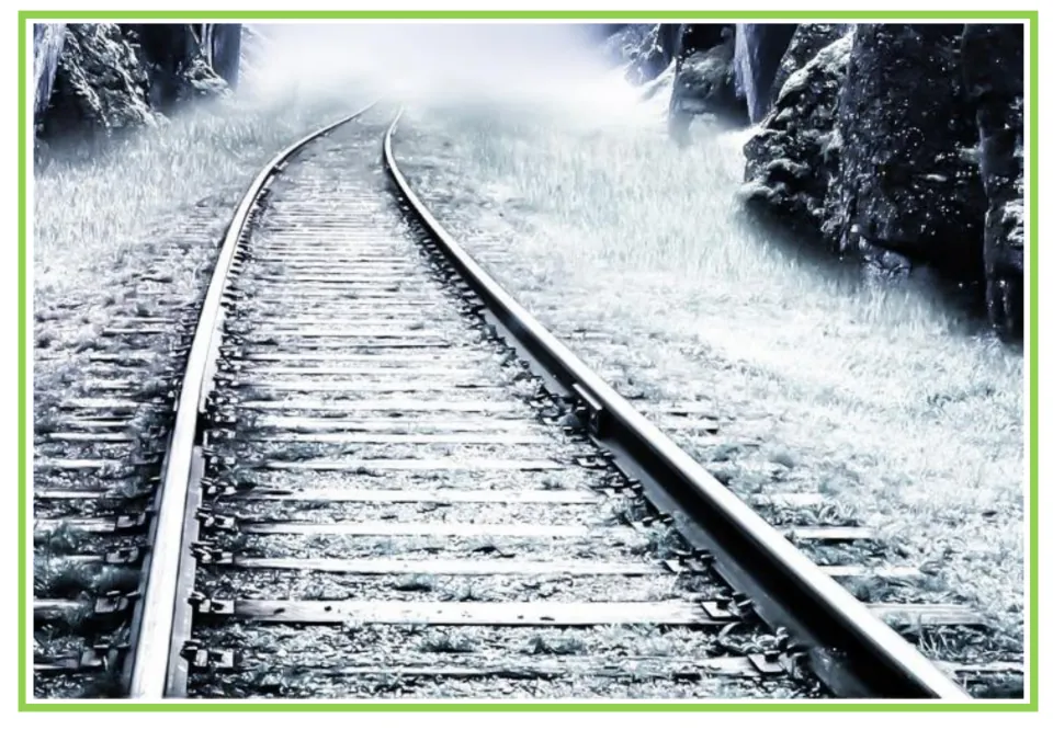 Train writing and discussion prompt card 4: railroad tracks curving through a misty, wooded landscape